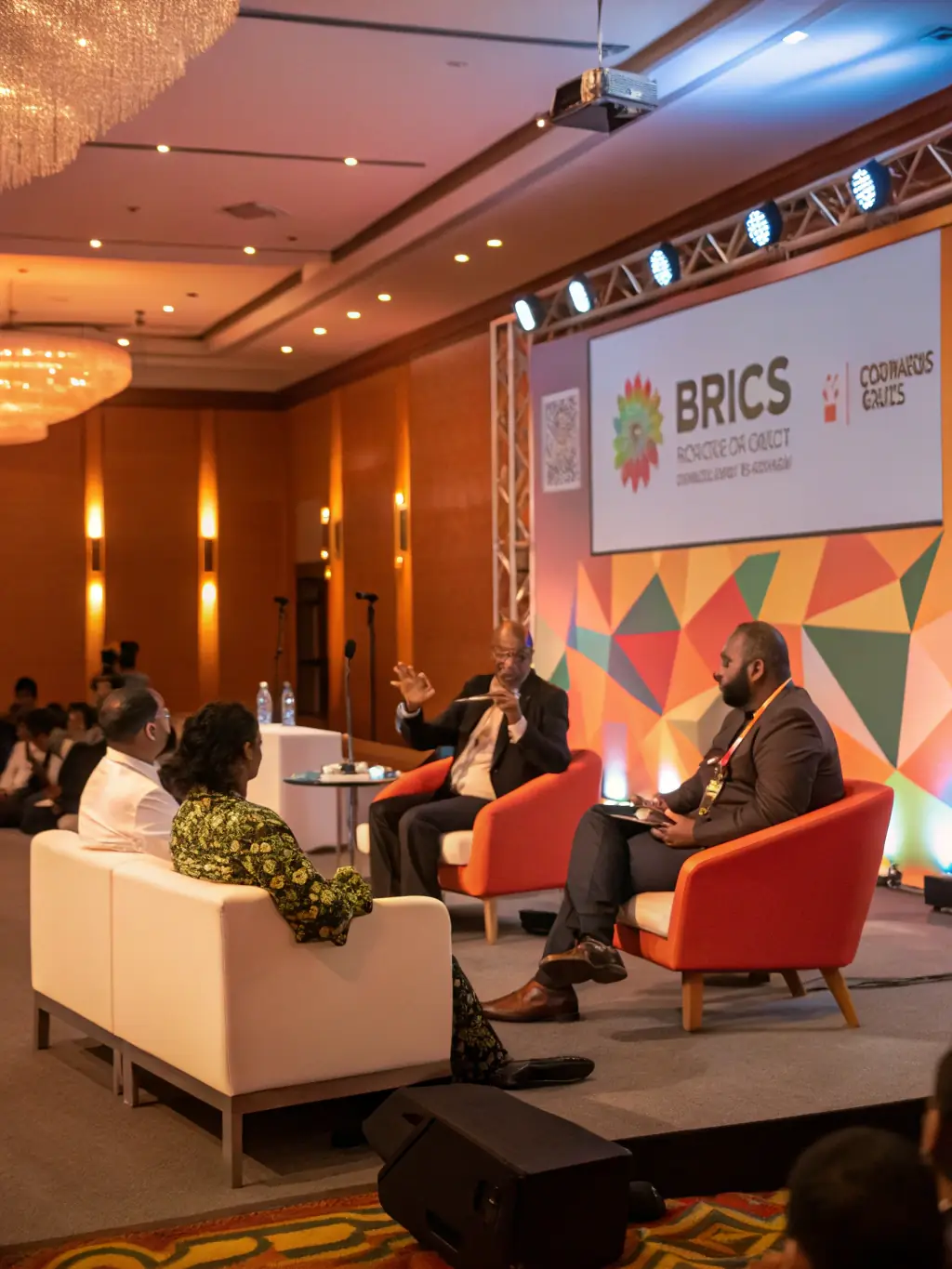 A vibrant photo capturing the energy of the Leadership Summit 2024 in Mumbai, featuring a panel discussion with renowned CEOs and entrepreneurs, showcasing engaged attendees and modern stage setup.